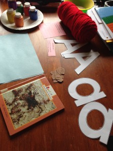 A few minutes cutting the a's, and making the ant book, yarn, paint, and construction paper handy helped prepare for a smooth day.
